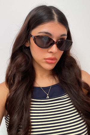 47 Tortoise with Black Lens Curved Oval Sunnies
