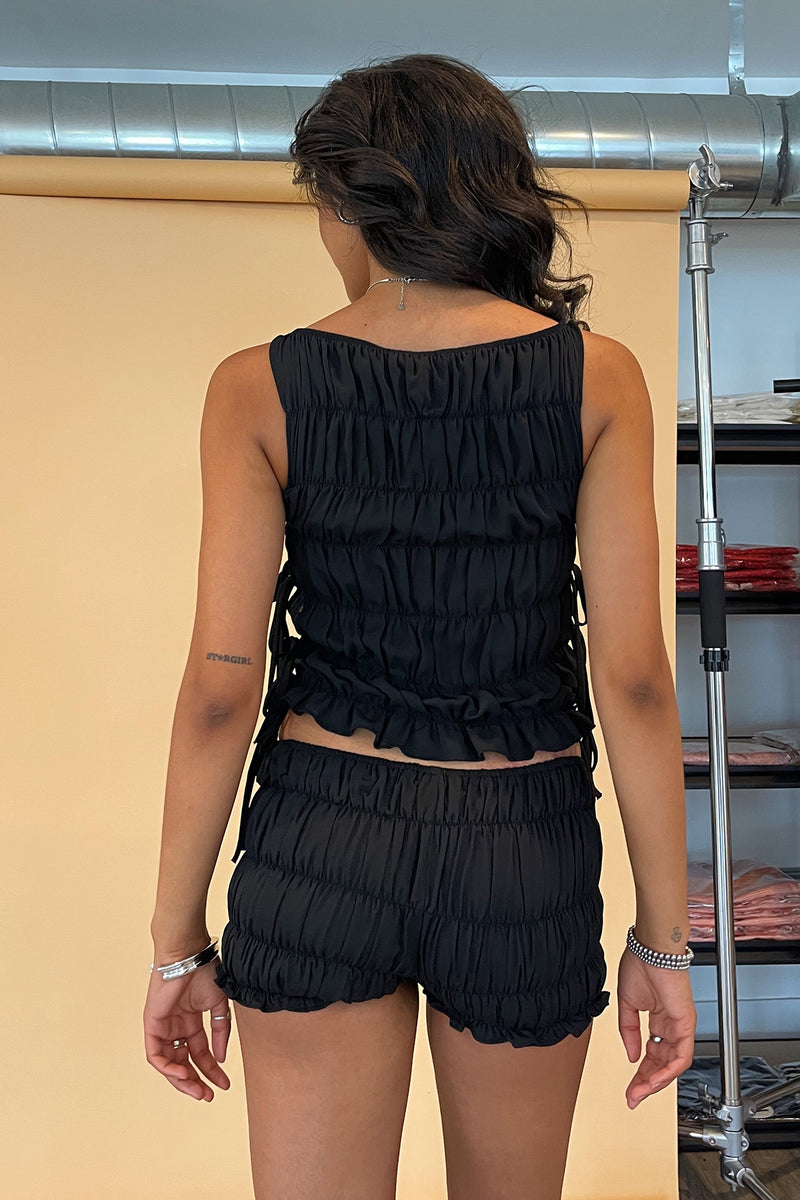 Out and About Black Smocked Mini Shorts