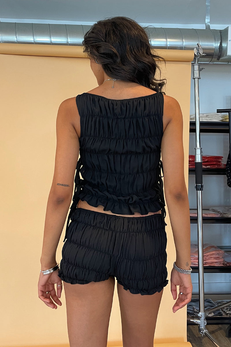 Out and About Black Smocked Side Tie Tank Top