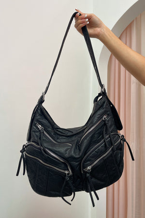Runaway Black Textured Faux Leather Crossbody Bag